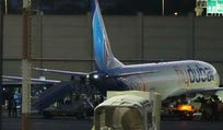 People disembark from a FlyDubai plane carrying Israelis who experienced an emergency landing in Saudi Arabia, after its arrival at Ben Gurion International Airport, near Tel Aviv, Israel, Wednesday, Sept. 30, 2026. (AP Photo/Ariel Schalit)