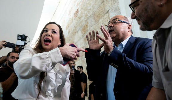 Tally Gotliv and Ahmad Tibi outside the hearing at the Supreme Court, Thursday. Credit: Itay Cohen Tally Gotliv and Ahmad Tibi outside the hearing at the Supreme Court, Thursday.