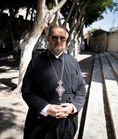 Father Constantine at St. George's Church in Jaffa Saturday. Credit: Moti Milrod Father Constantine at St. George's Church in Jaffa Saturday.
