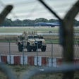 An armoured vehicle patrols the interior at RAF Fairford base in Fairford, south-west England, last week.