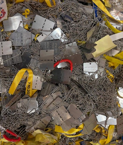 Dog-tags, pins and ribbons associated with the Israeli hostages in Gaza, as seen at "Rooted: A Testament to Jewish Resilience," a new art installation by Dede Bandaid and Nitzan Mintz at the Museum of Jewish Heritage in New York, October 9, 2026.
