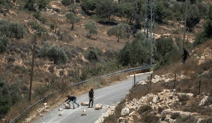An improvised roadbloack set up by settlers near a Palestinian village in the West Bank. Credit: Itay Ron An improvised roadbloack set up by settlers near a Palestinian village in the West Bank.