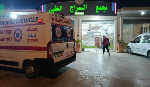 An ambulance outside a West Bank hospital where members of a Palestinian family reportedly wounded in an attack by Israeli settlers posing as soldiers were taken Monday.