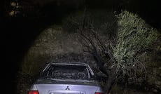 A burned car in the Palestinian village of Mukhmas, east of Ramallah, after an arson attack reportedly carried out by Israeli settlers overnight Tuesday.