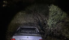 A burned car in the Palestinian village of Mukhmas, east of Ramallah, after an arson attack reportedly carried out by Israeli settlers overnight Tuesday.