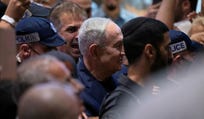 Prime Minister Benjamin Netanyahu at a shopping mall in the central Israeli city of Holon, Tuesday.