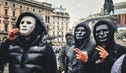 Masked protesters in Milan, Italy, on Sunday. Credit: Aria Castelnuovo Masked protesters in Milan, Italy, on Sunday.