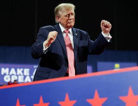President Donald Trump dances at a rally for Republican Sen. Roger Marshall in Park City, Kansas, on Oct. 19, 2026.