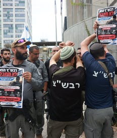 Settlers demonstrating at defense headquarters in Tel Aviv against the Shin Bet security service's detention of settler security-squad members, last week. Credit: Tomer Appelbaum Settlers demonstrating at defense headquarters in Tel Aviv against the Shin Bet security service's detention of settler security-squad members, last week.