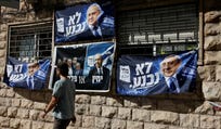Likud posters reading "we shall not surrender" in Jerusalem.