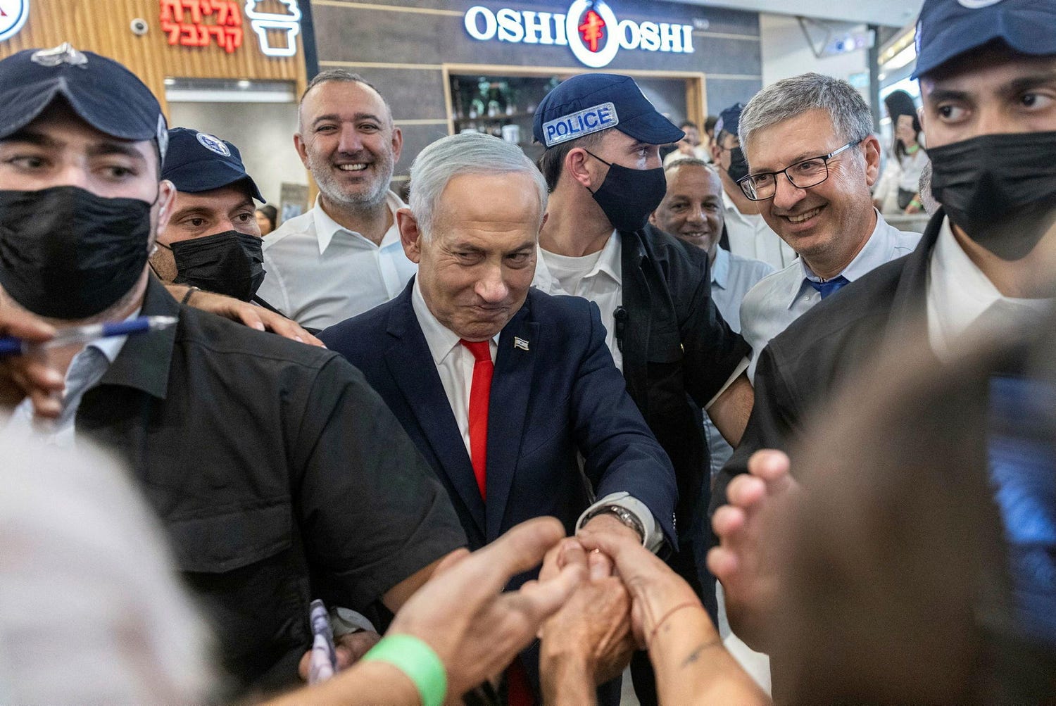 Prime Minister Benjamin Netanyahu shaking hands at a campaign stop in Ramle, last week