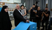 United Arab List chairman Mansour Abbas casting his ballot on Tuesday during Israel's elections.