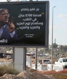 A billboard in Rahat, featuring National Security Minister Itamar Ben-Gvir, October. It reads, "Ben-Gvir is proud 'we destroyed 5700 houses in the Negev and I will destroy more and more and more.'". Credit: Eliahu Hershkovitz A billboard in Rahat, featuring National Security Minister Itamar Ben-Gvir, October. It reads, "Ben-Gvir is proud 'we destroyed 5700 houses in the Negev and I will destroy more and more and more.'"