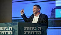 Far-right Finance Minister Bezalel Smotrich speaks to his supporters Tuesday night.